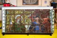 CU of Burne Jones Angeli Ministrantes in the workshop the glass around the edge is so called sacrifical glass used when fixing the window and not part of the window photo Finnbarr Webster photo G